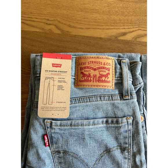 Levi's 314 Shaping Straight Jeans Size 27/32 Light Wash Denim NWT - Picture 1 of 4